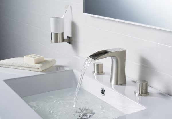 water pouring from a modern faucet