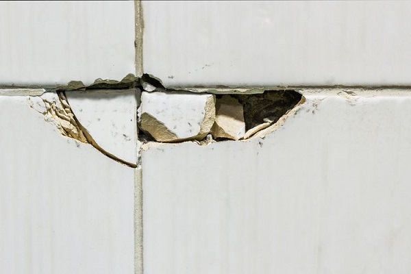 Ceramic tiles with cracks and holes