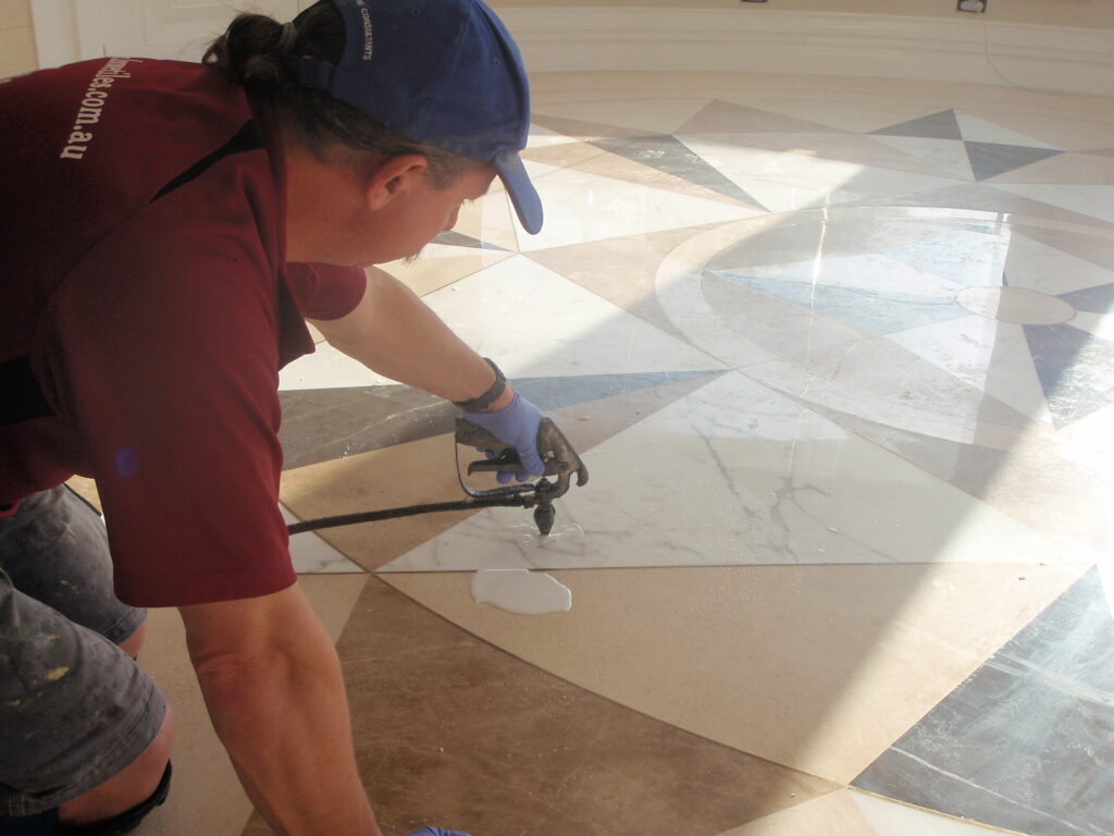 man fixing tiles